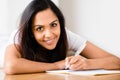 Happy Indian woman student education writing studying Royalty Free Stock Photo