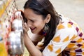 Women looking into bioscope at Surajkund Mela