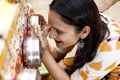 Women looking into bioscope at Surajkund Mela