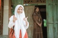 Happy indonesian student getting ready to school