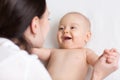Happy infant baby looking at mom Royalty Free Stock Photo