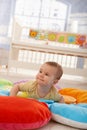 Happy infant on playmat Royalty Free Stock Photo