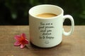 Happy Inspirational quote - You are a good person and you deserve to be happy. With white mug of coffee and self notes on it. Royalty Free Stock Photo
