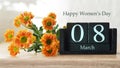 Happy Internacional Womens Day card. Wooden calendar and  chrysanthemum flowers Royalty Free Stock Photo