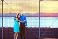 Happy interracial couple standing together outdoors Royalty Free Stock Photo