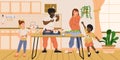 Happy interracial family at the kitchen cooking and preparing for dinner. Cheerful mixed couple with kids. Parents and children Royalty Free Stock Photo