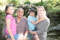 Nterracial family laughing and having fun with Hispanic African American Father, Caucasian mother and Metis children son and daugh