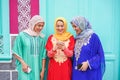 Happy islamic frends using smartphone - Young arabian girls having fun with new social app outdoor - Technology, influencer and