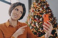 Happy italian female making video call during winter holidays, talking with family online Royalty Free Stock Photo
