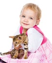 Happy ittle girl hugging kitten. isolated on white background Royalty Free Stock Photo