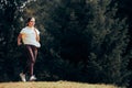 Happy Jogger Training Outdoors in Cardio Sprint Exercise