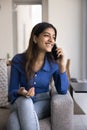 Happy joyful beautiful Indian woman enjoying mobile phone call Royalty Free Stock Photo