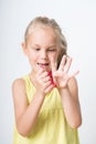 Happy joyful girl playing a red slime