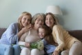 Happy joyful kid girl, mom, grandmother celebrating 8 march Royalty Free Stock Photo