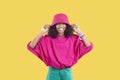 Happy Black girl in trendy casual outfit laughing and having fun in fashion studio Royalty Free Stock Photo