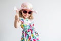 Happy joyful little girl smiling showing thumbs up Royalty Free Stock Photo