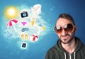 Happy joyful man with sunglasses looking at summer icons Royalty Free Stock Photo