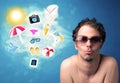 Happy joyful man with sunglasses looking at summer icons Royalty Free Stock Photo