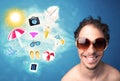 Happy joyful man with sunglasses looking at summer icons Royalty Free Stock Photo