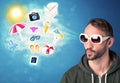 Happy joyful man with sunglasses looking at summer icons Royalty Free Stock Photo