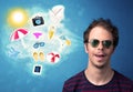 Happy joyful man with sunglasses looking at summer icons Royalty Free Stock Photo