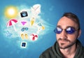 Happy joyful man with sunglasses looking at summer icons Royalty Free Stock Photo