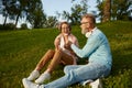 Happy joyful senior couple eating ice-cream in park Royalty Free Stock Photo