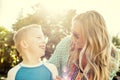 Happy joyful young family having fun outdoors park Royalty Free Stock Photo