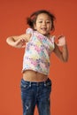 Happy jumping asian girl Royalty Free Stock Photo