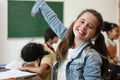 Happy junior school student looking at camera with smile Royalty Free Stock Photo