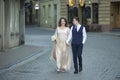 Happy Just Married Couple Having a Stroll Outdoors