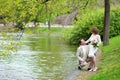 Happy just married couple near water