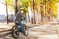 Happy kid boy riding his bike on cycle lane Royalty Free Stock Photo