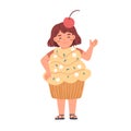 Happy kid disguised in funny carnival costume of sweet cupcake. Girl wearing dessert candy shaped clothes for Halloween Royalty Free Stock Photo