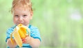 Happy kid eating banana fruit Royalty Free Stock Photo