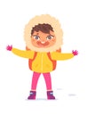 Happy kid enjoying winter hiking adventure, little child with backpack and warm clothes