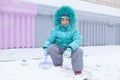 Happy kid girl child outdoors in winter playing Royalty Free Stock Photo