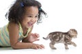 Happy kid girl playing with kitten Royalty Free Stock Photo