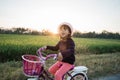 Happy kid girl riding her bicycle outdoor Royalty Free Stock Photo
