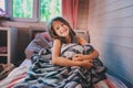 happy kid girl waking up in early morning in her room Royalty Free Stock Photo