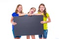 Happy kid girls holding black board copyspace Royalty Free Stock Photo