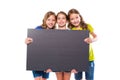 Happy kid girls holding black board copyspace