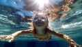 Happy kid have fun in swimming pool. swimming under water, Funny child swim, dive in pool jump deep down underwater from poolside