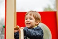 Happy kid having fun on playground. Portrait of happy child Royalty Free Stock Photo
