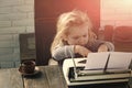 Happy kid having fun. small boy or businessman child with typewriter Royalty Free Stock Photo