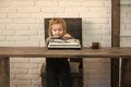 Happy kid having fun. small boy or smiling businessman child with typewriter Royalty Free Stock Photo