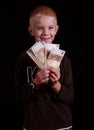 Happy kid holding euro. Royalty Free Stock Photo