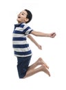 Happy Kid Jumping in The Air Royalty Free Stock Photo