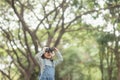 Happy kid looking ahead. Smiling child with the binoculars. Travel and adventure concept. Freedom, vacation Royalty Free Stock Photo