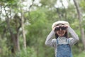 Happy kid looking ahead. Smiling child with the binoculars. Travel and adventure concept. Freedom, vacation Royalty Free Stock Photo